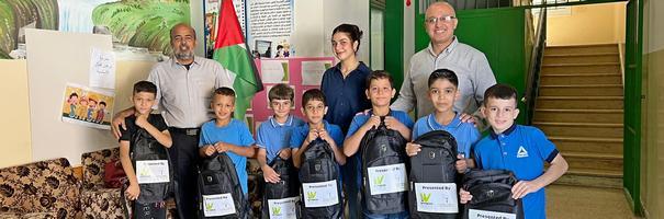 Schoolchildren with new back packs